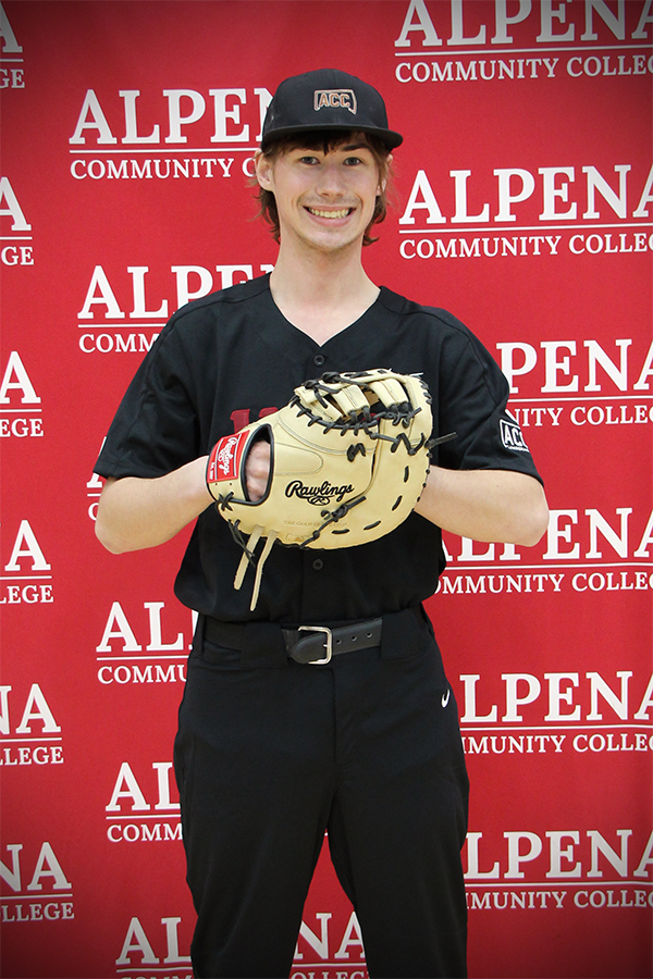 Evan Fairbanks poses with a glove for his baseball photo