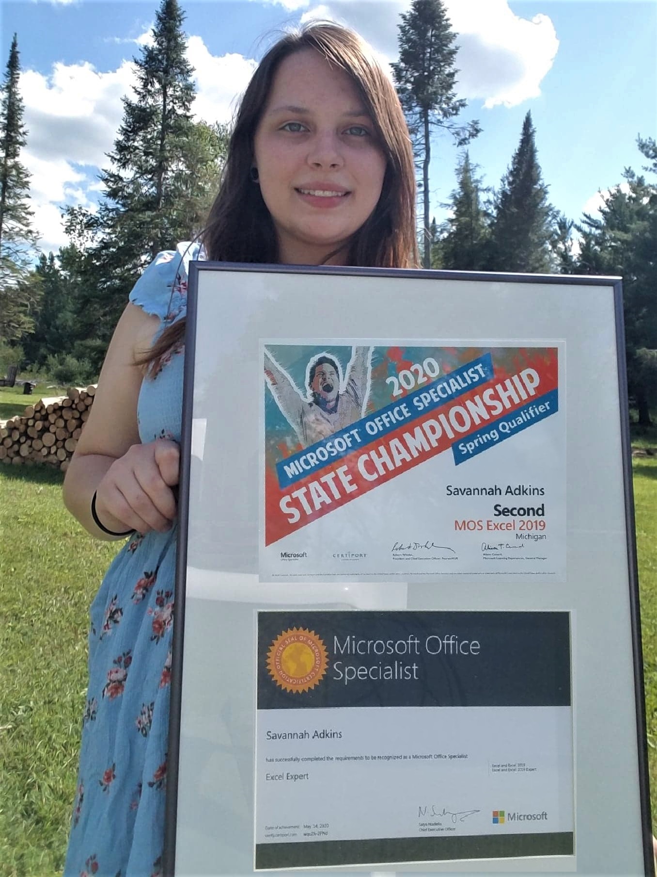 Graduate Savannah Adkins poses with her Microsoft Office Specialist Certification